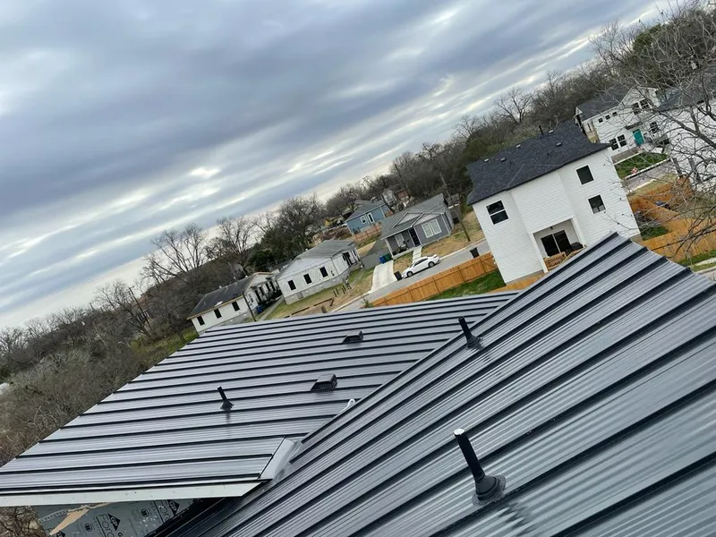 Standing seam metal roof panels with vents for Skylight Repair in Hillsboro